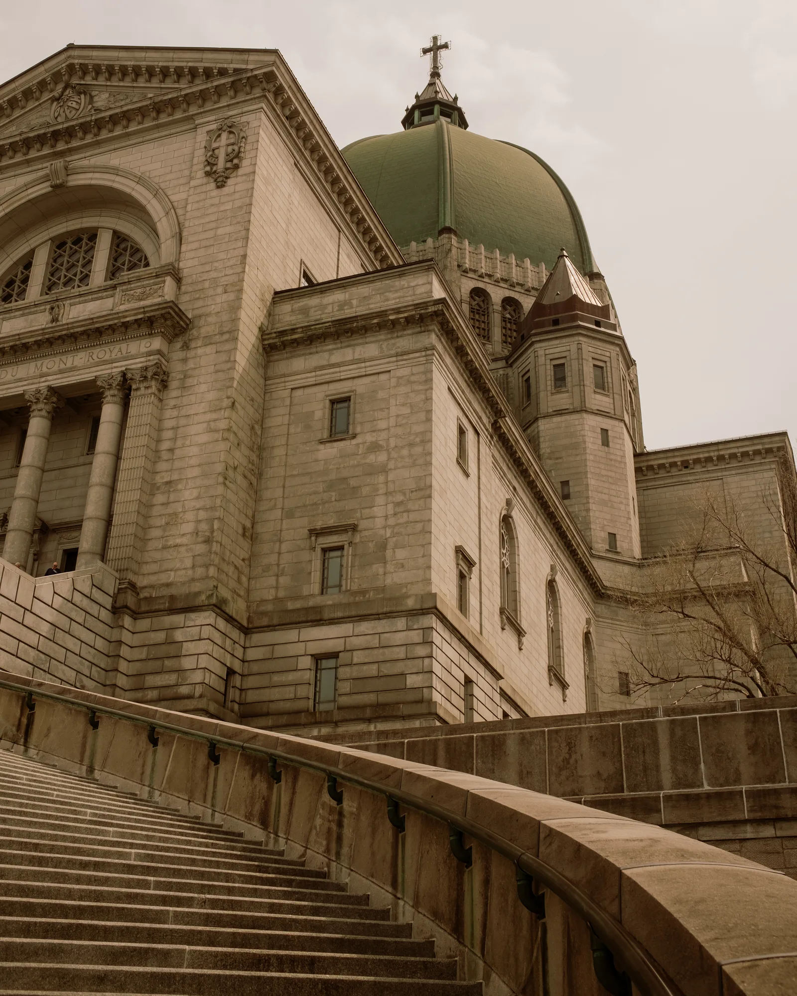 Saint Joseph's Oratory with its green dome above a curving stone staircase, Montreal
